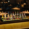 image:imageVEVOR LED Lighted Liquor Bottle Display 1 Tier 48 Inches Whiskey Rack Supports USB Illuminated Home Bar Shelf with RF Remote amp App Control 7 Static Colors Acrylic Lighted Shelf for 12 Bottles3 Step 70 Inches